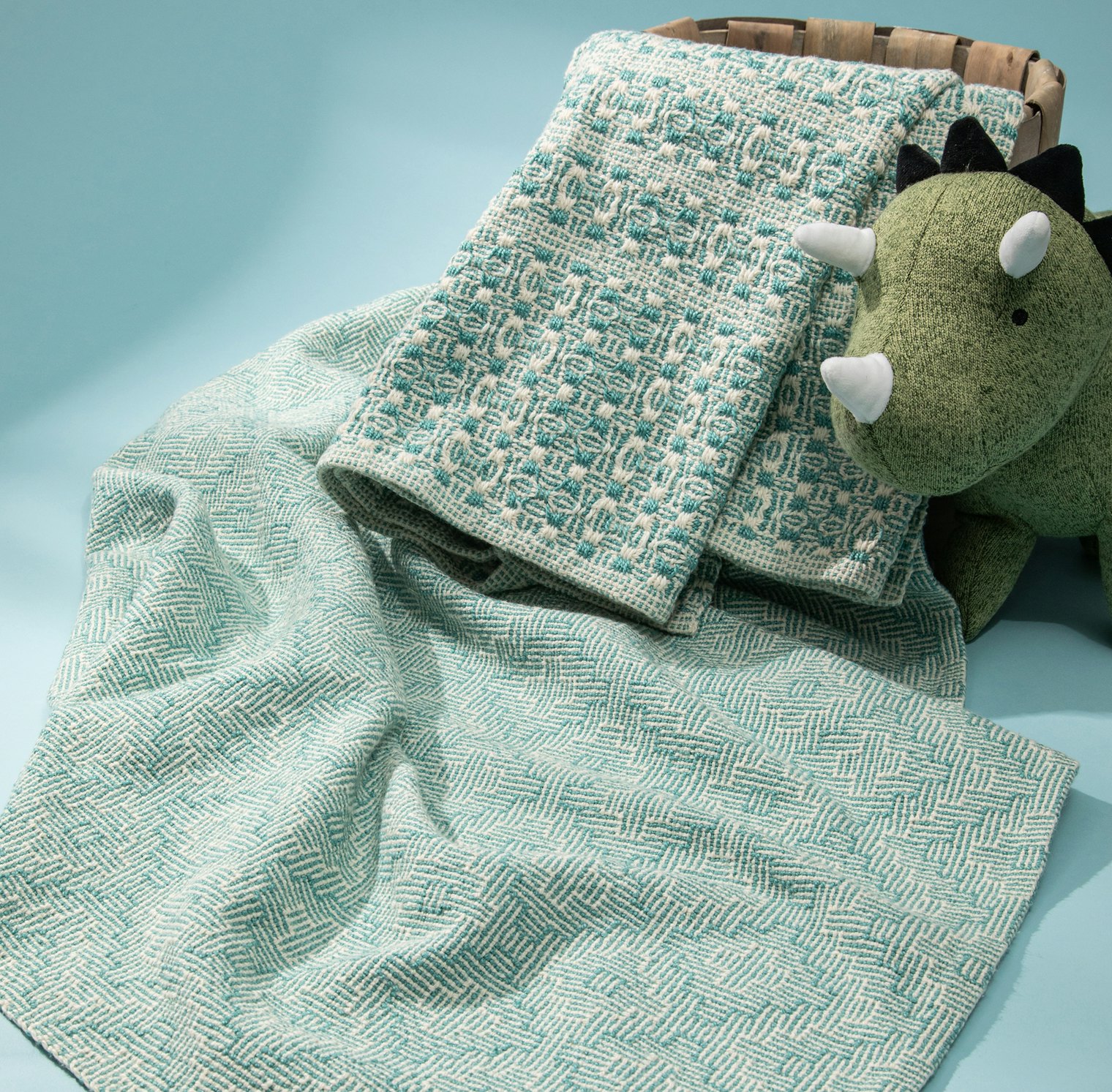 Annette Swan Schipf’s Fraternal Twins Towels are woven in huck using color-and-weave, and in shadow weave.