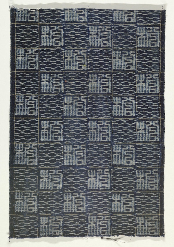 Textile with checkerboard design of two alternating geometric patterns created in the weft ikat or kasuri technique. Cotton, indigo dyed, plain weave. Pattern described as "seal script." Source: Narumi, Honshu, Japan. Late 19th Century. Courtesy of Cooper Hewitt, CC0 license
