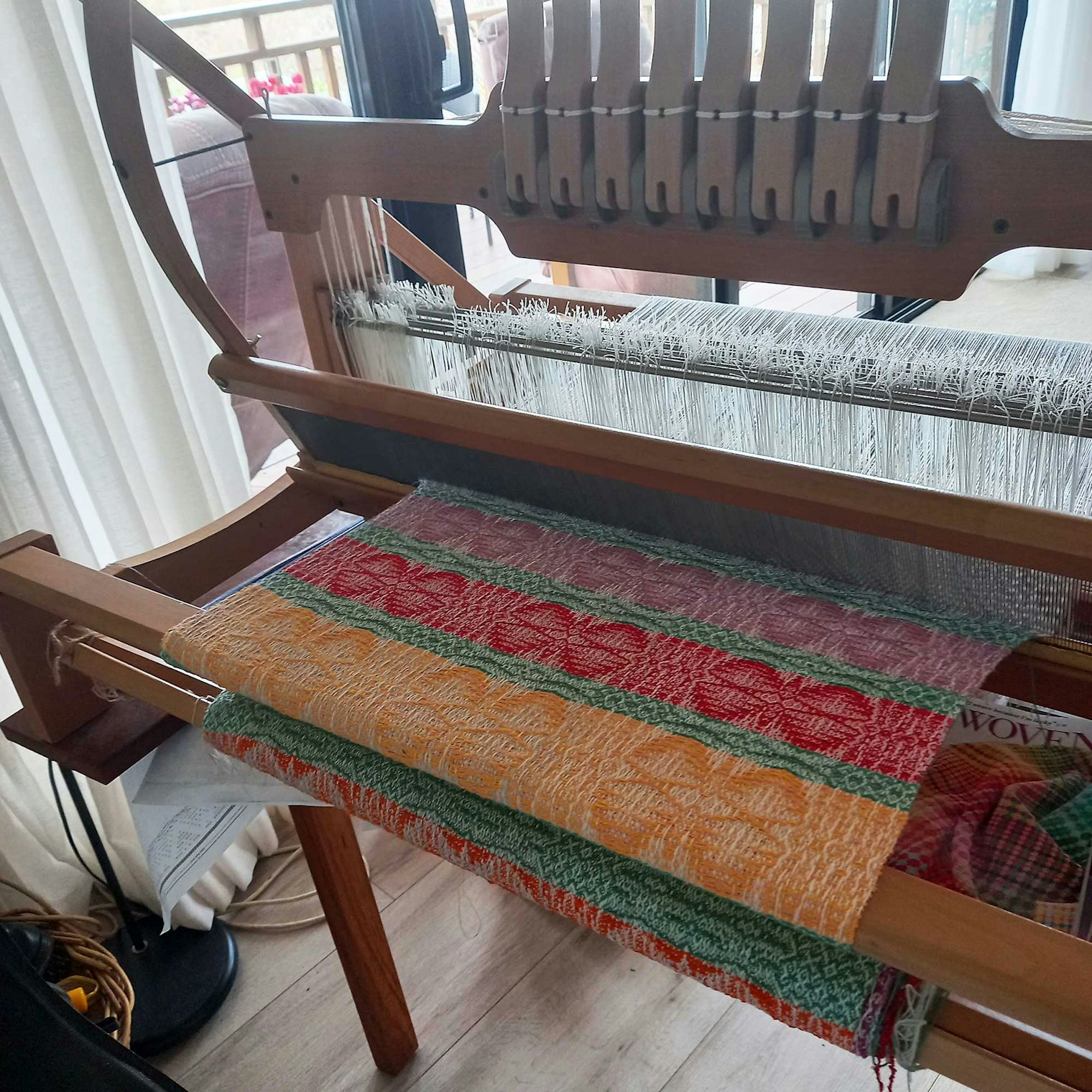 Meryl Hilyard’s version of Tina Glassenbury’s Hawk Moth Towels design n the loom