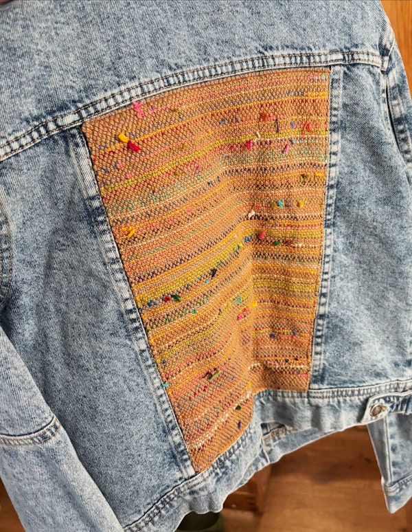 Nancy Currey’s denim jacket with a thrums fabric panel on the back.