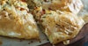 Artichoke, Feta, and Tomato Tart with Summer-Ale Tapenade Recipe Image
