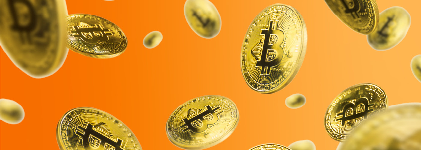 Bitcoins falling across an orange background.