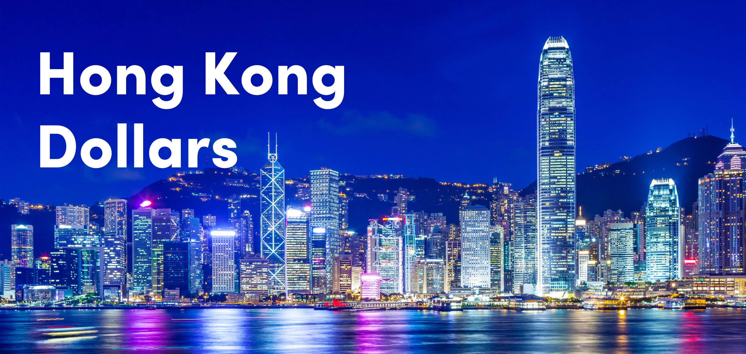 hong kong city skyline at night viewed from Victoria Harbour