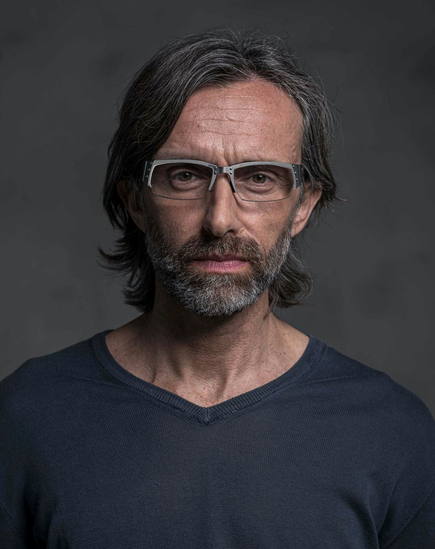 The model is wearing Touring 930 Aluminium glasses with vision lenses
