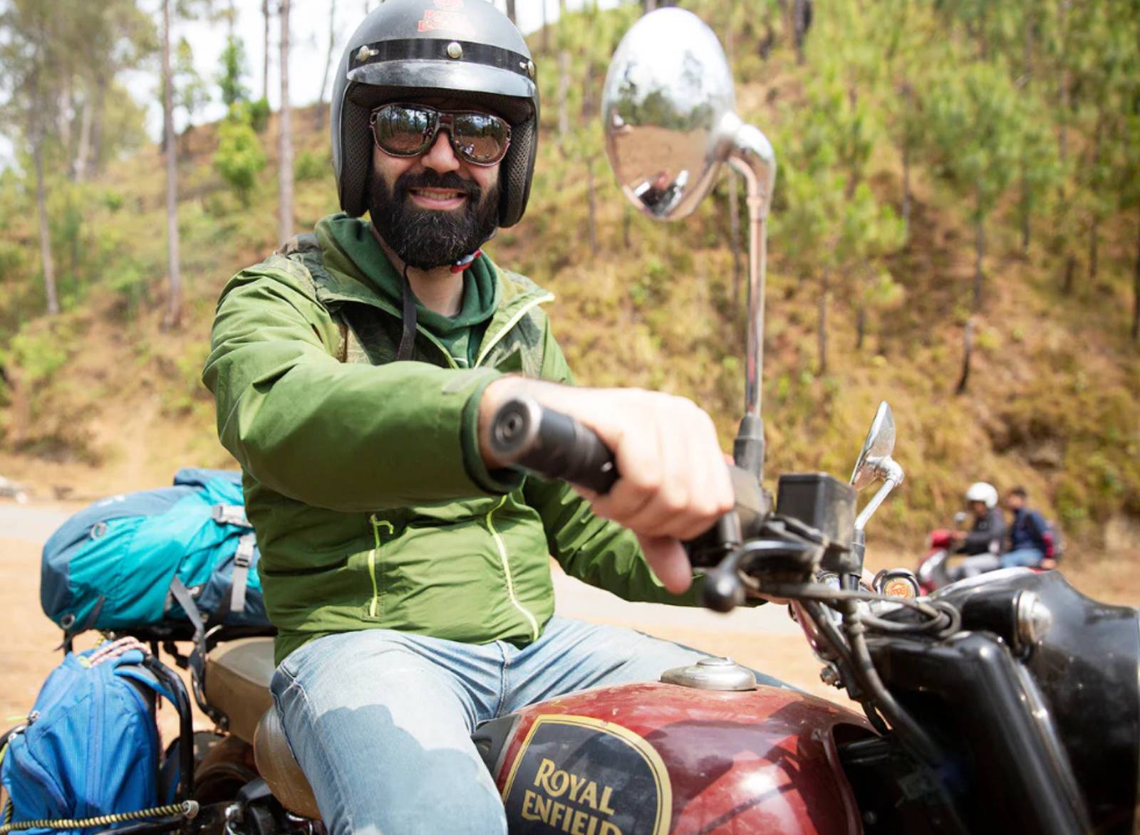 Andrea motorbike tourist in Nepal with Emblema glasses