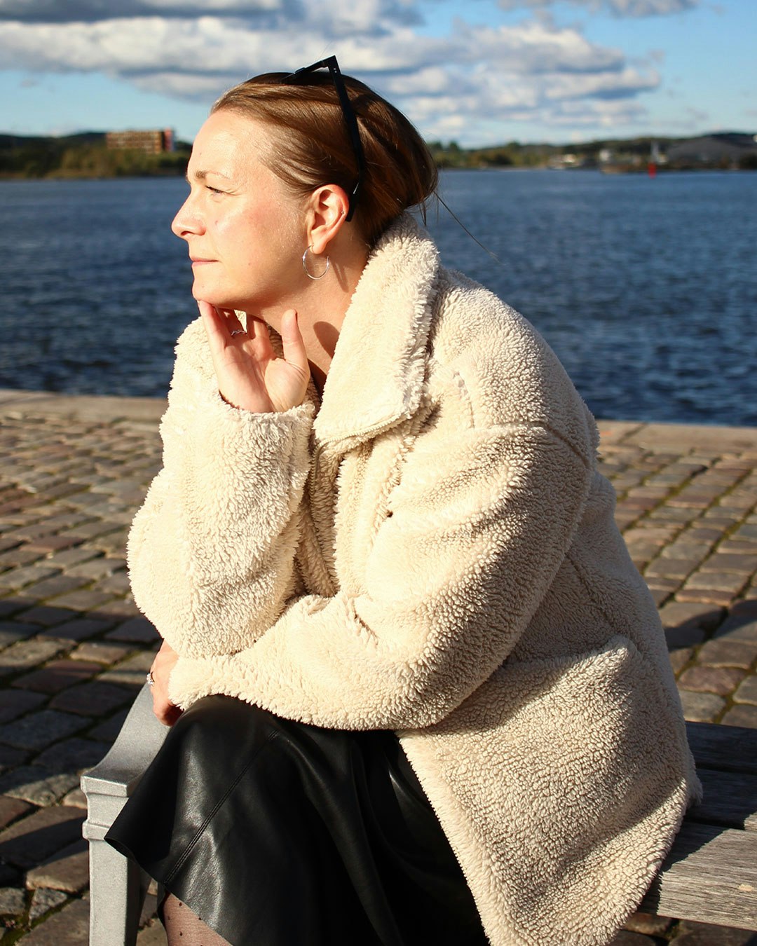 Malin sitting by the sea