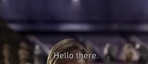 animated gif of Obi Wan kenobi standing up saying and with the caption  of "Hello there"