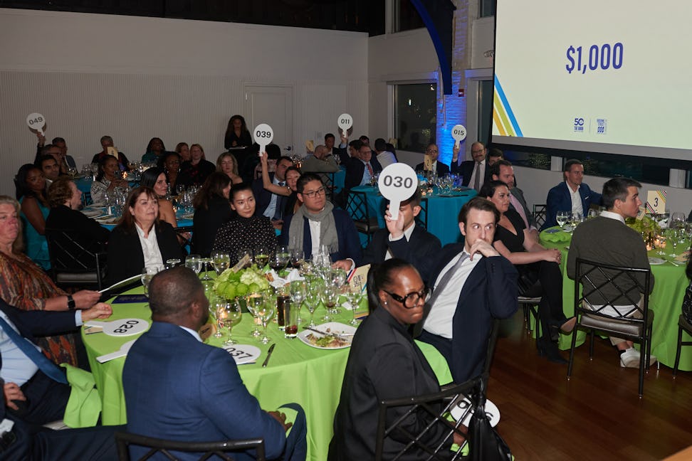 The Door Fall Gala 2023 paddle raise