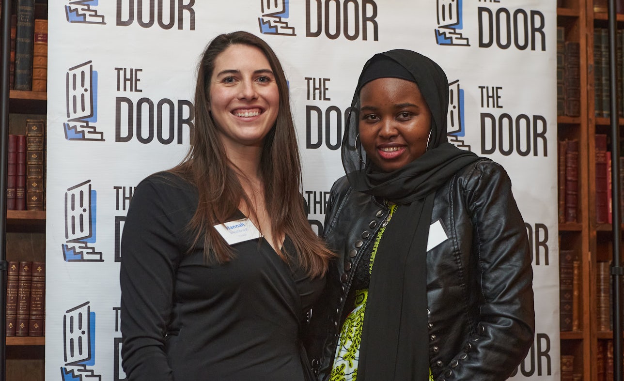 The Door client Iram Barry (right), with her attorney Hannah Weichbrodt from our Legal Services Center