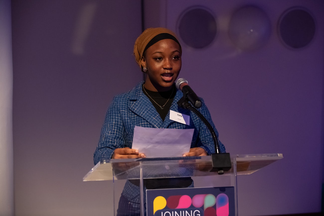 The Door client Taty D. delivering her speech.