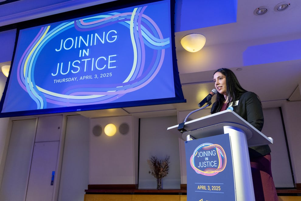 Meena Shah, Co-Managing Director of the Legal Services Center, The Door, delivering her speech