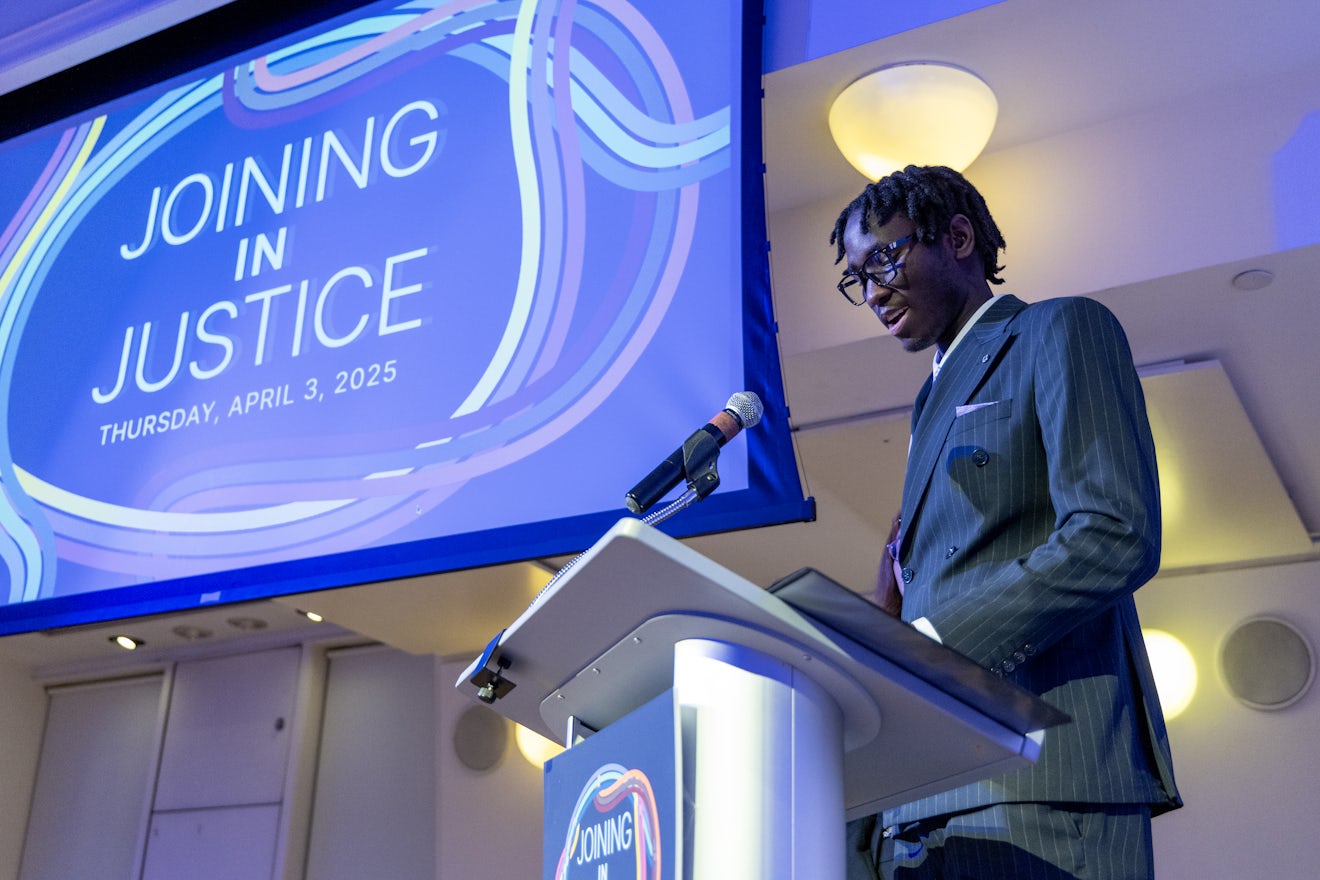 The Door client Djiby delivering his speech.