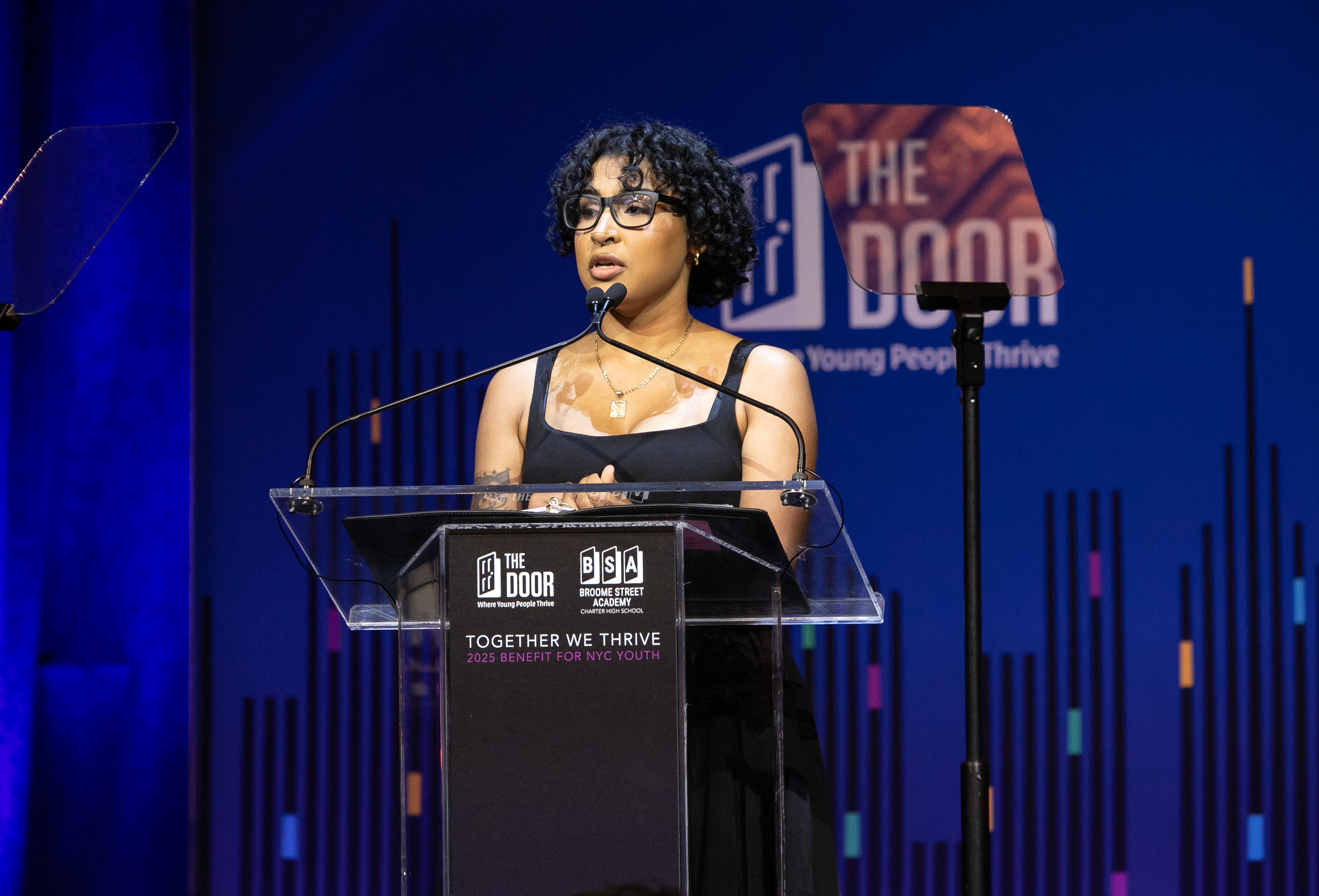 Former Door Member, Kelsie, delivering her remarks