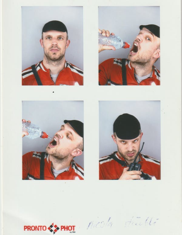 Bike messenger in a photobooth