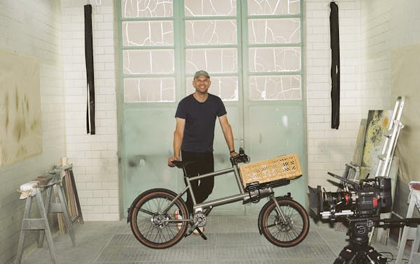 MONoPOLE CO-Founder holding the No O1 Toolbike