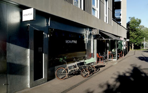 A couple of test bikes parked outside MONoPOLE's store at Zollhaus