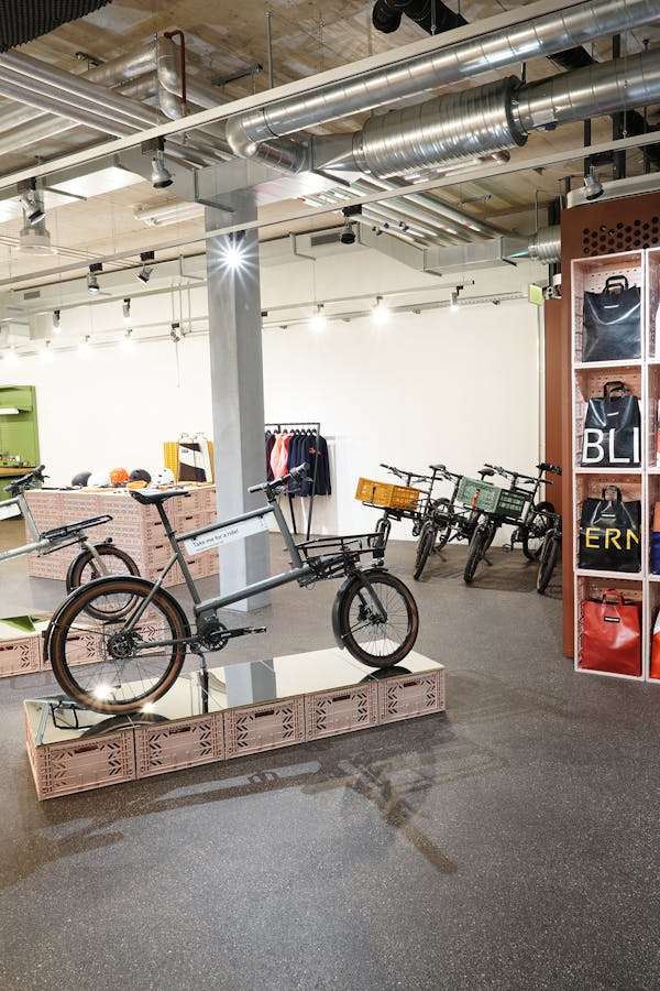 Inside view of MONoPOLE Zurich store — displaying Toolbike No O1, Freitag bags and POC helmets