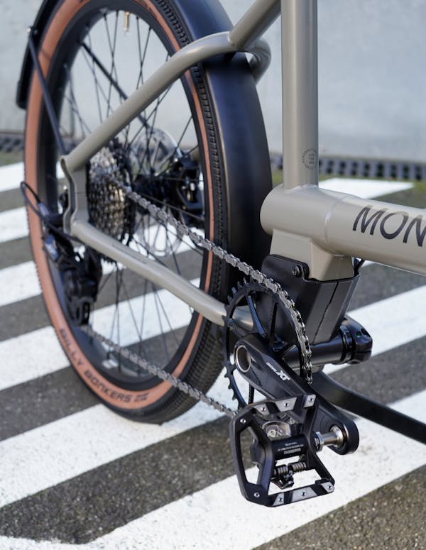 Close-up of bike drivetrain, and pedals.