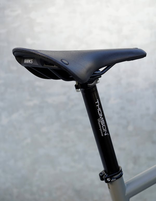 Brooks bike seat and Thomson seat post.