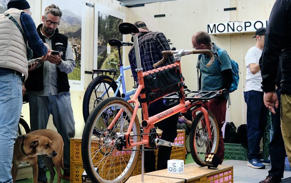 MONoPOLE orange cargo bike at BESPOKED booth