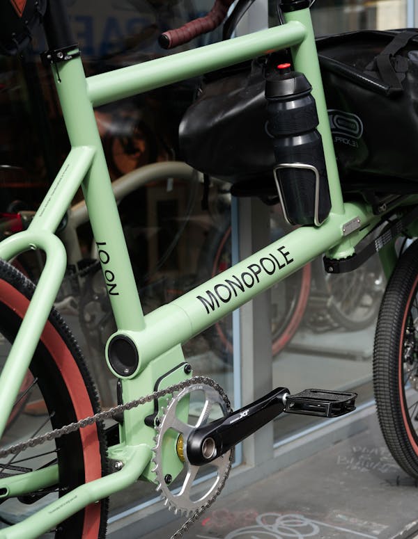 Green Cargo Bike with Chain and Water Bottle Holder
