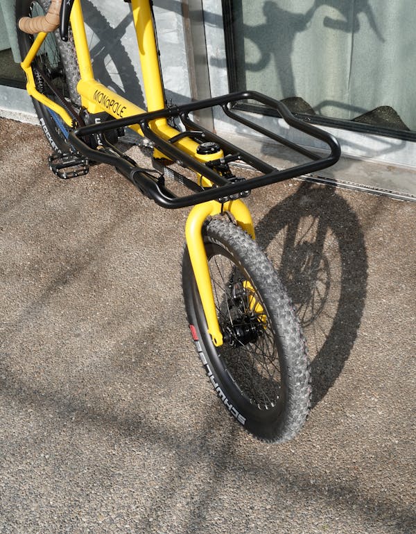 Top view of the yellow MONoPOLE custom cargo e-bike, featuring the platform rack.