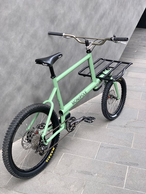 MONoPOLE pale green custom cargo bike rear side view.