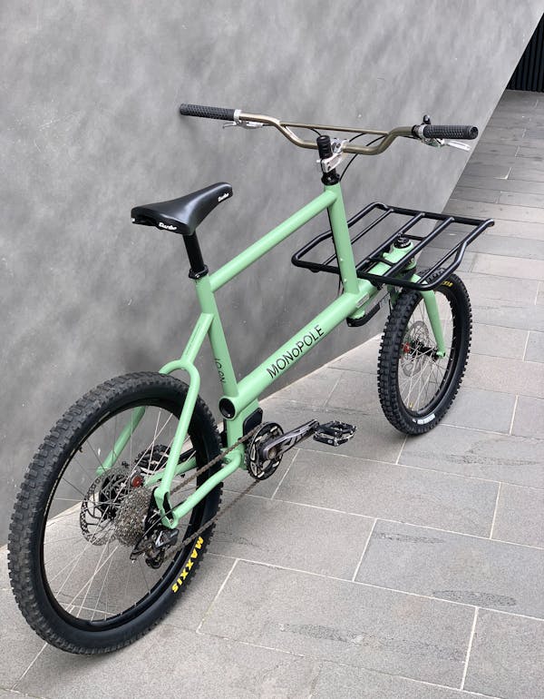 MONoPOLE pale green custom cargo bike rear side view.