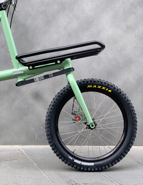 Close-up of MONoPOLE's belt steering featuring the Platform cargo rack on the front.