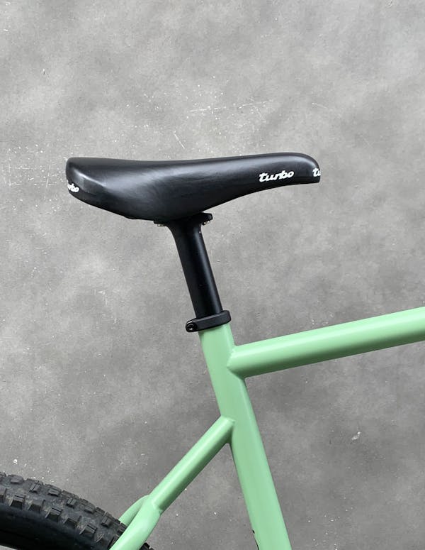 Close-up of the bicycle's saddle.