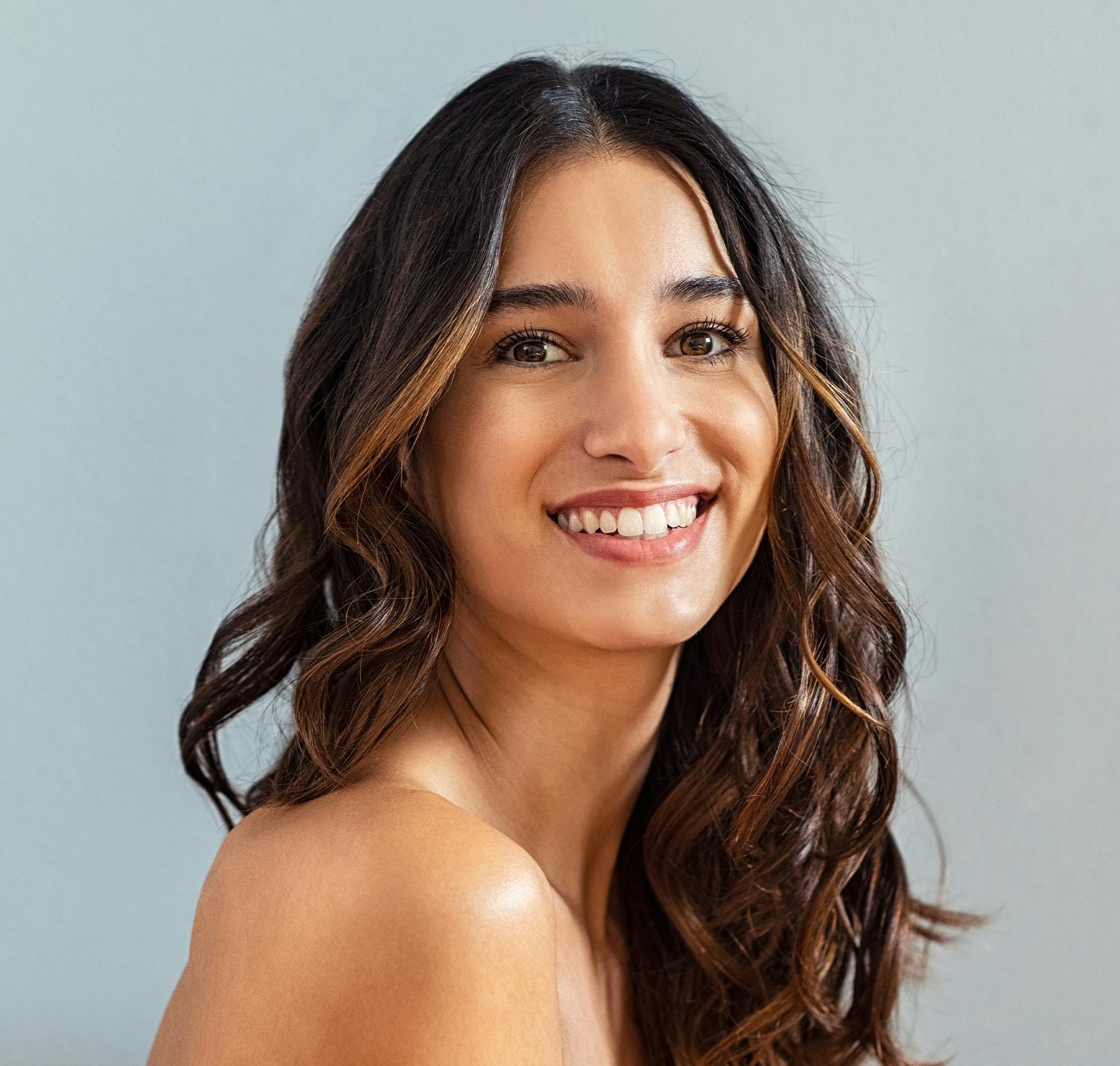 Woman looking over her shoulder