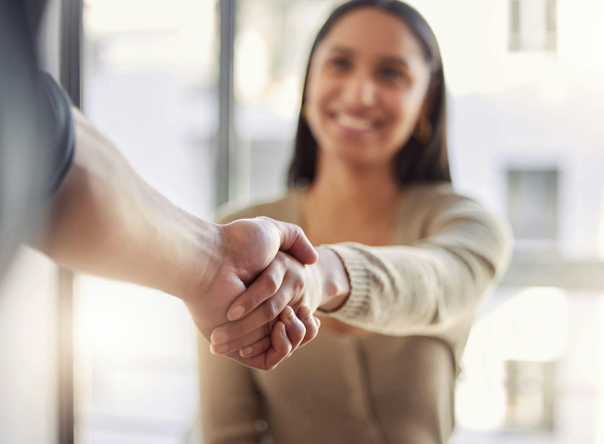 Woman shaking hands