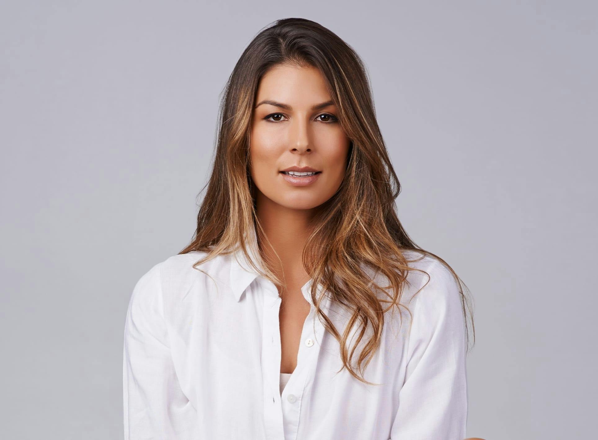 Woman in white top