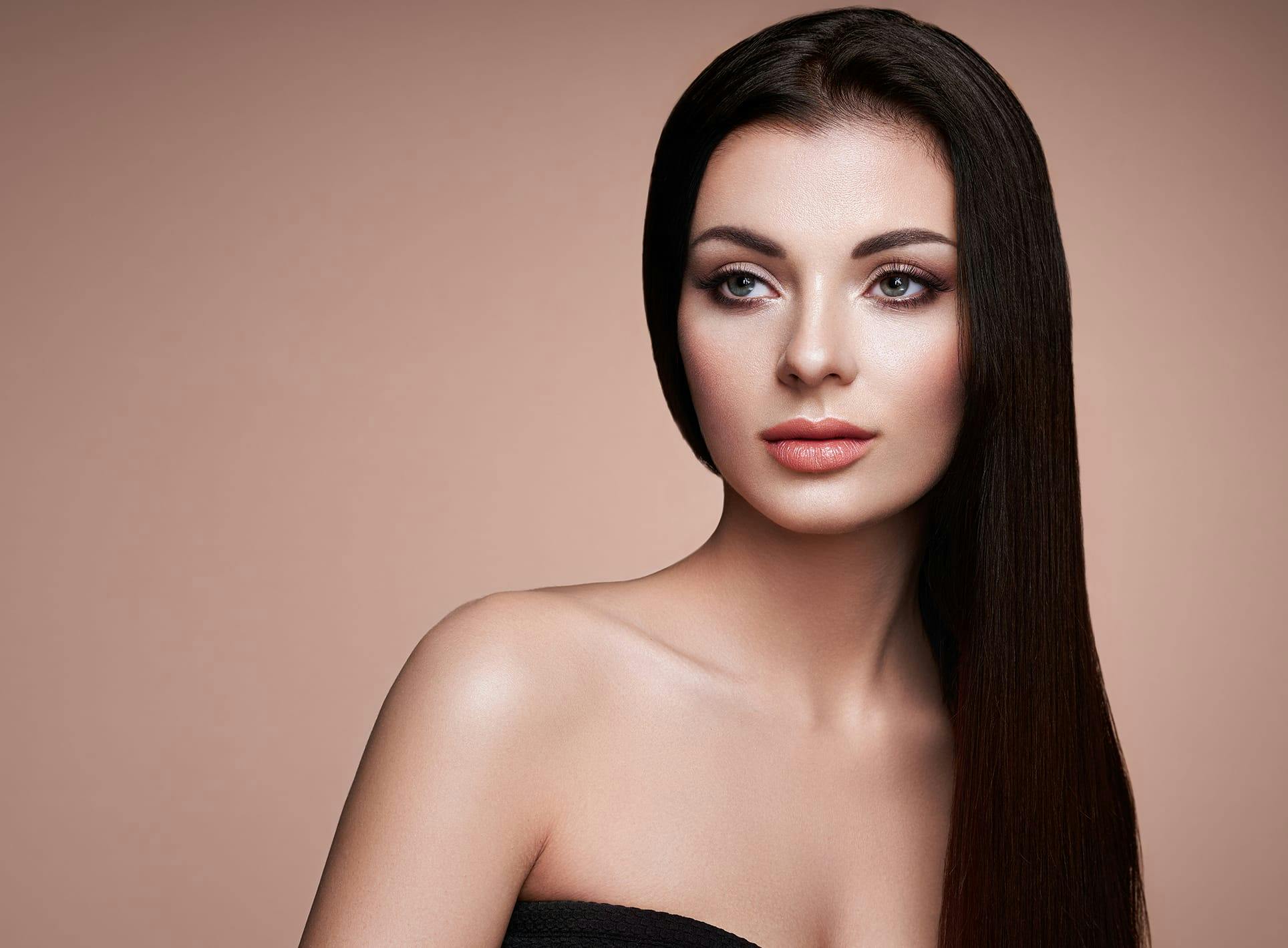 A woman's face and shoulders.