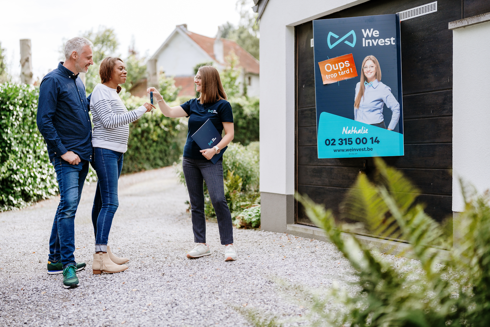 Agent immobilier avec ses clients