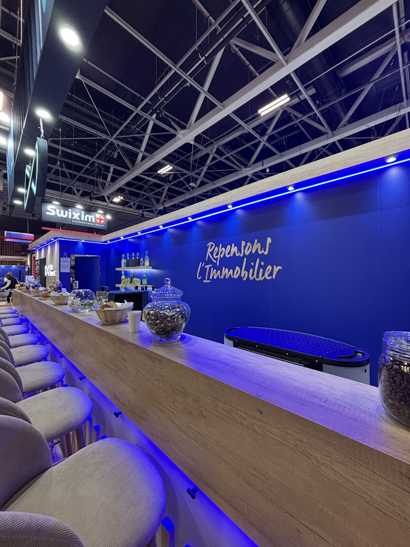 Stand We Invest au salon de l'immobilier RENT