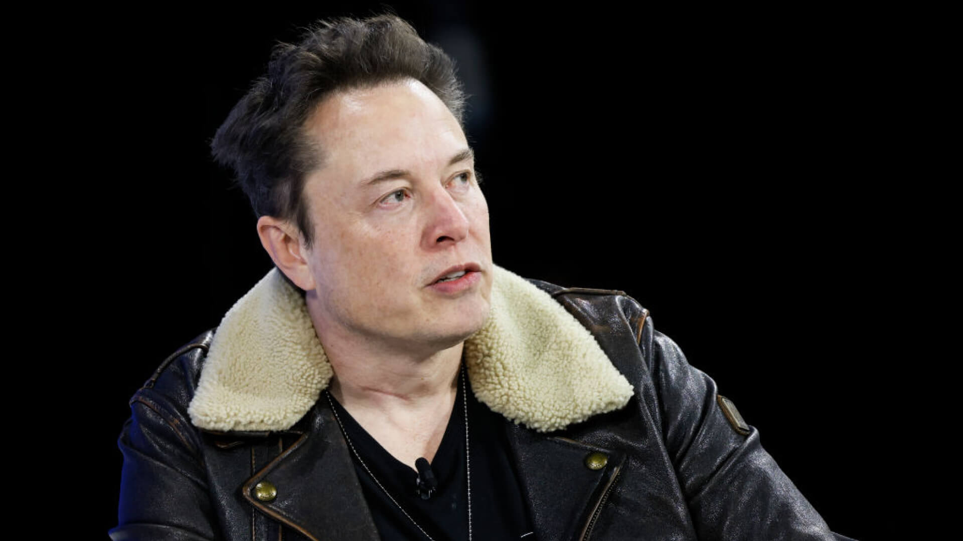 Elon Musk looking