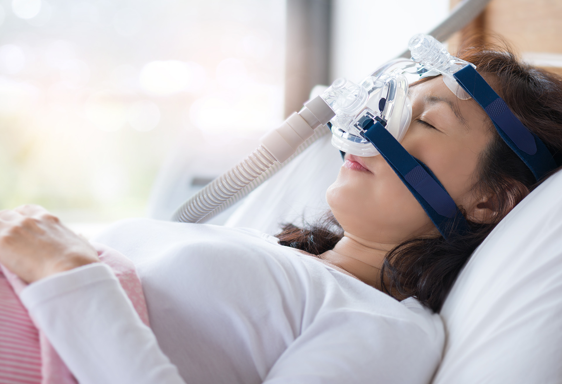 Woman with Sleep Apnea