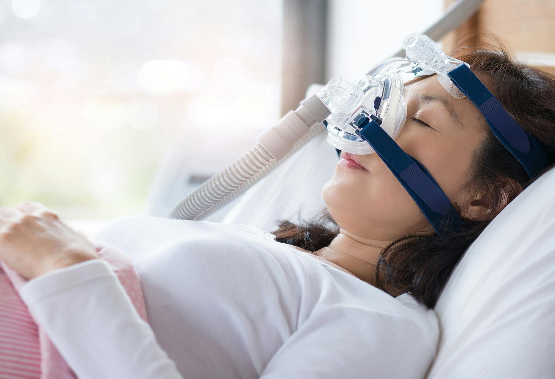 Woman with Sleep Apnea