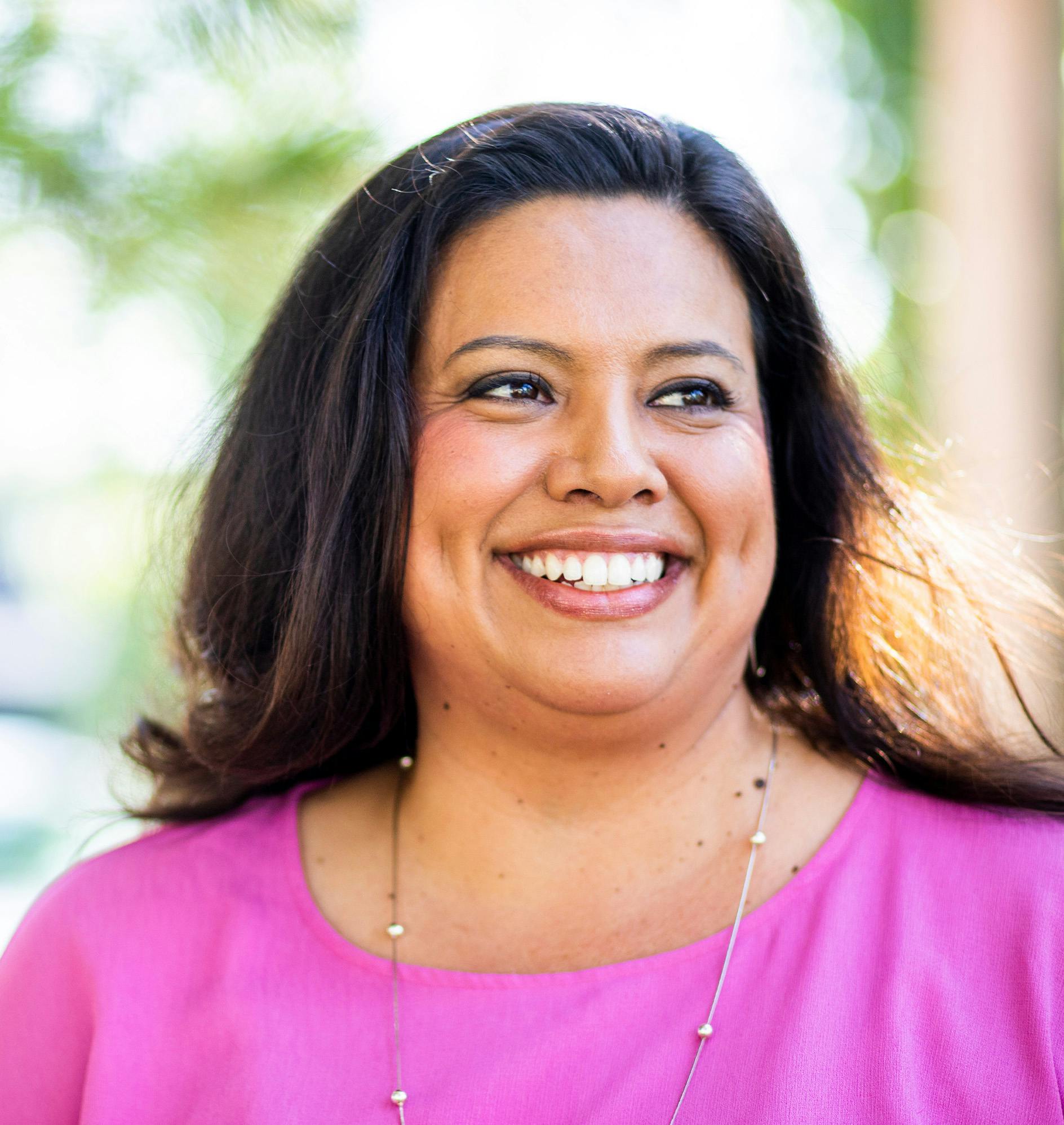 Smiling Woman with a Pink Shirt