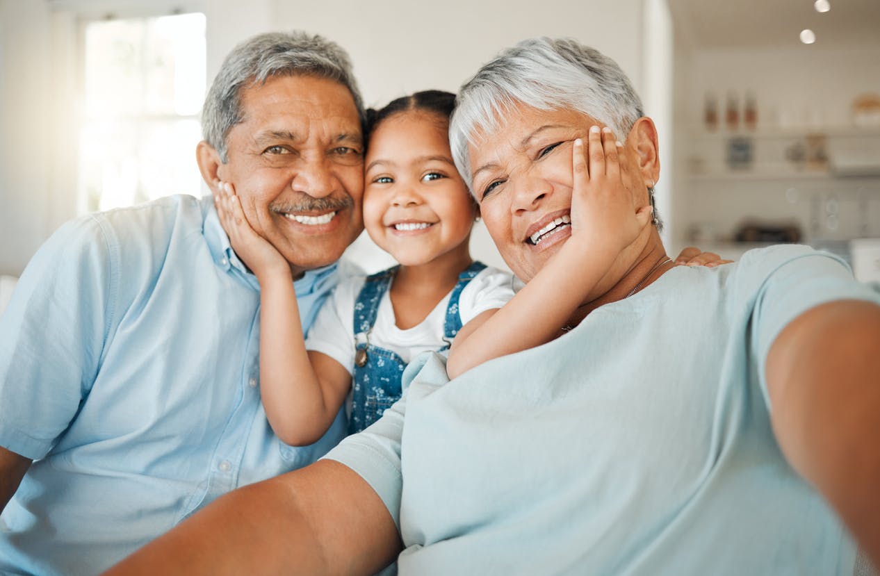 Man, woman and child smiling
