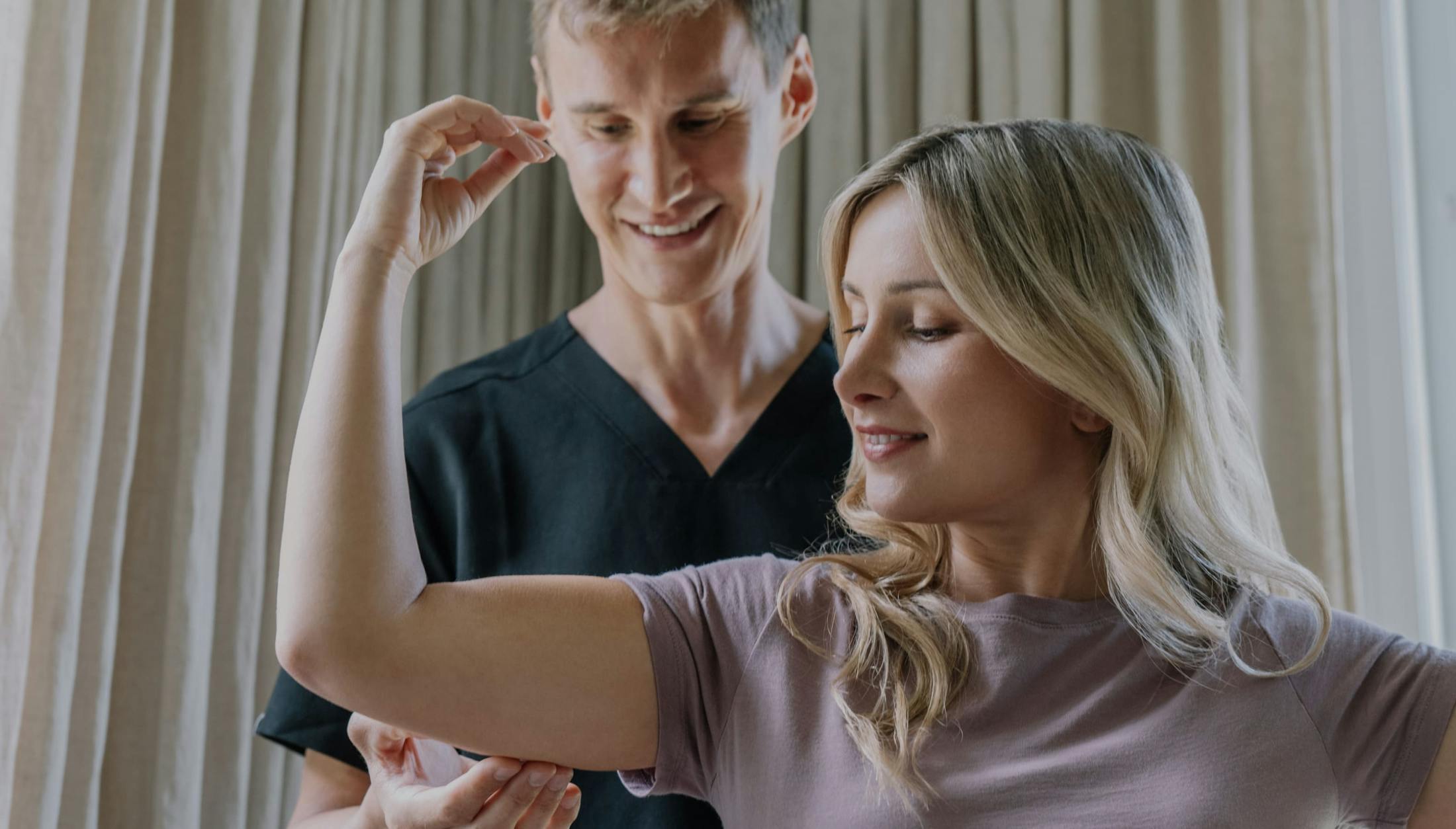 Plastic Surgeon Dr. Markelov working with a patient in Tampa Bay.