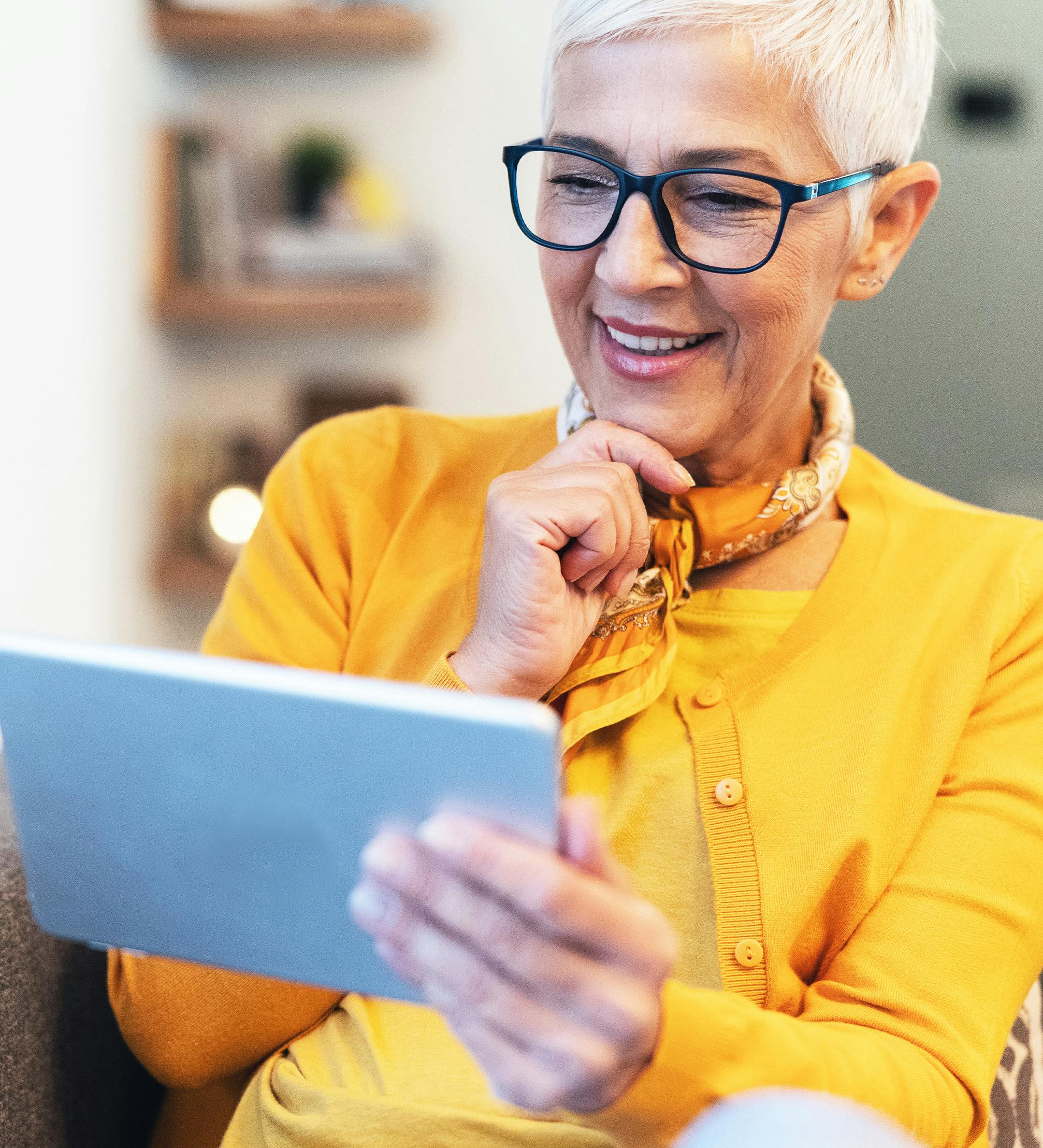 Woman reading a tablet
