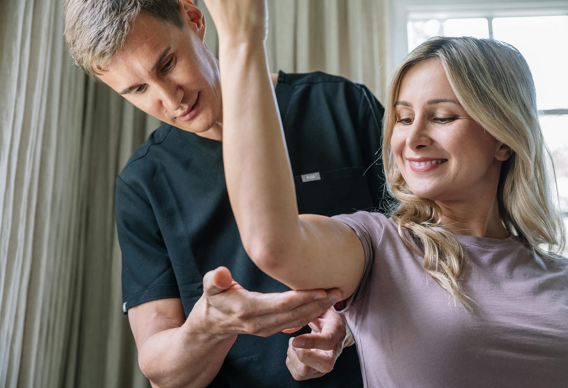 Dr. Markelov consulting with a patient.
