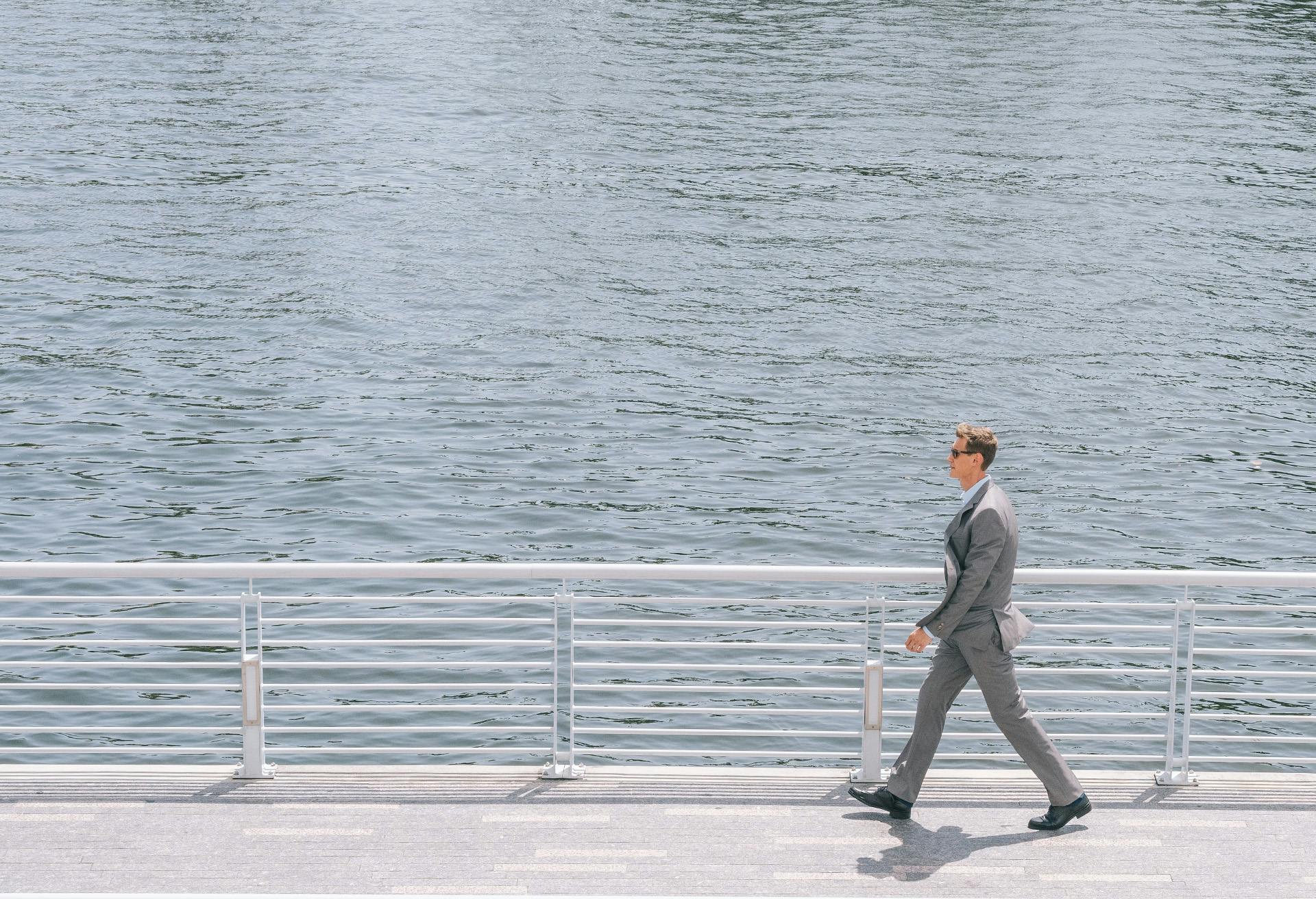 Dr. Markelov walking by the water.
