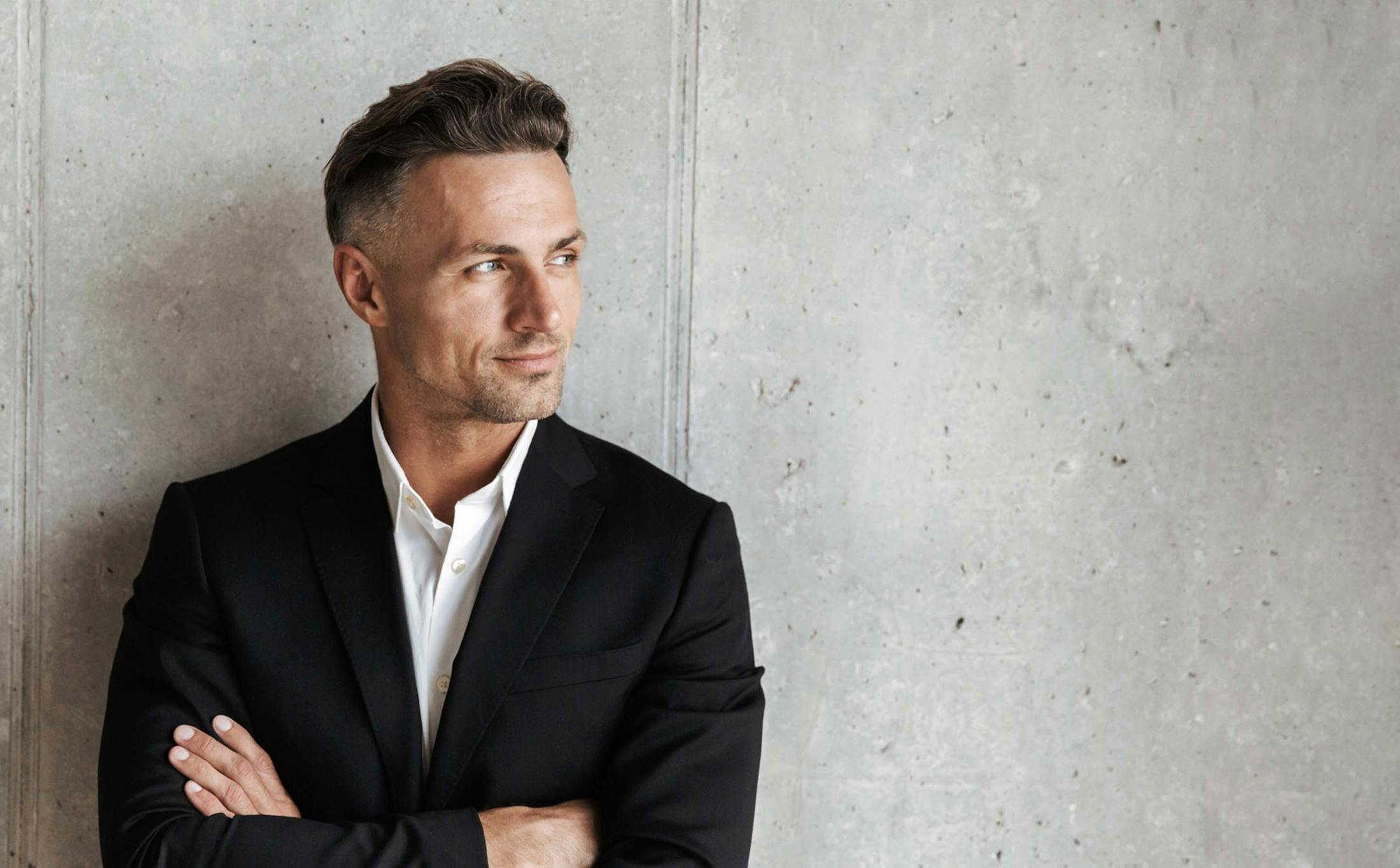 Confident man posing in sports coat