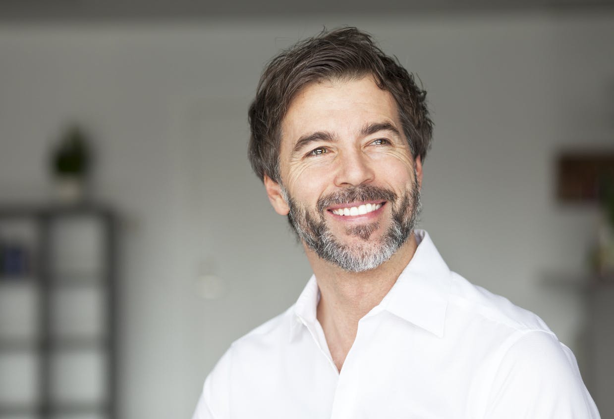 Smiling middle aged man