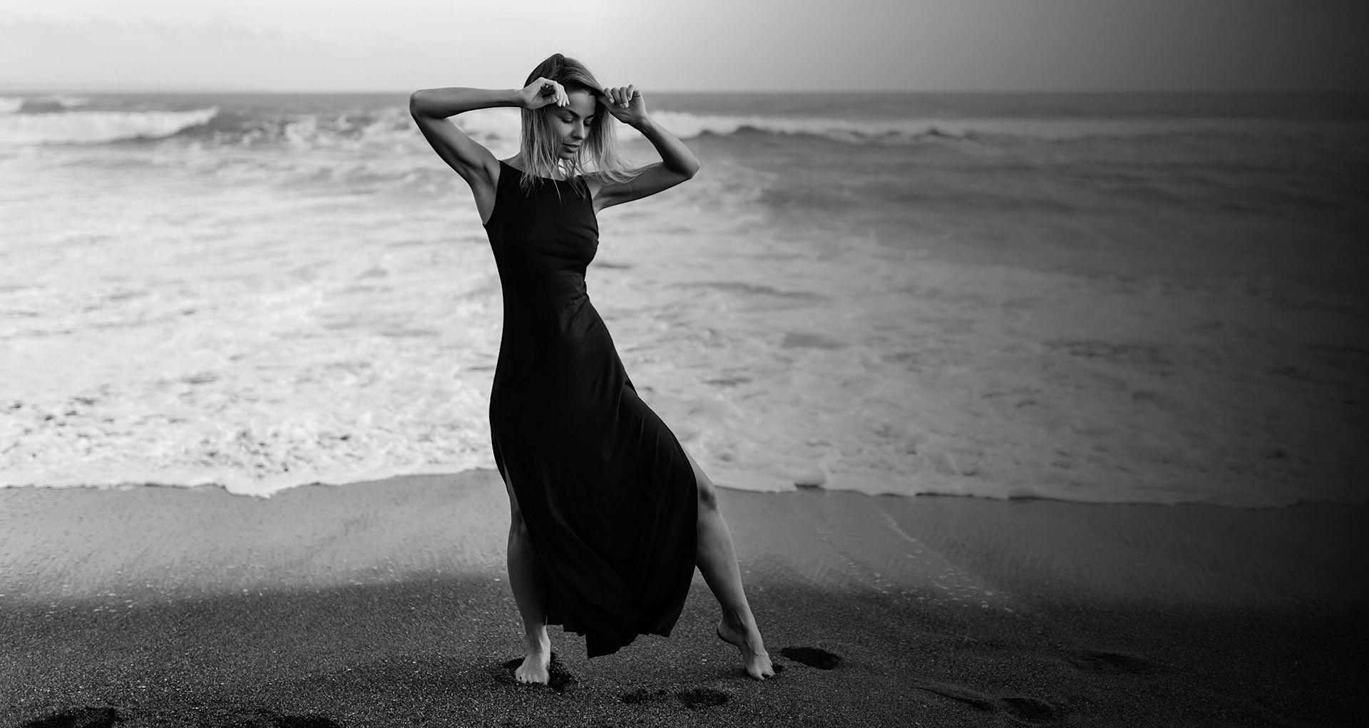 Woman in a dress at the beach