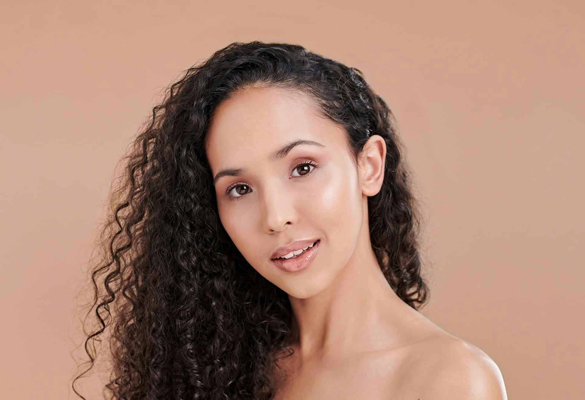 woman with brown curly hair