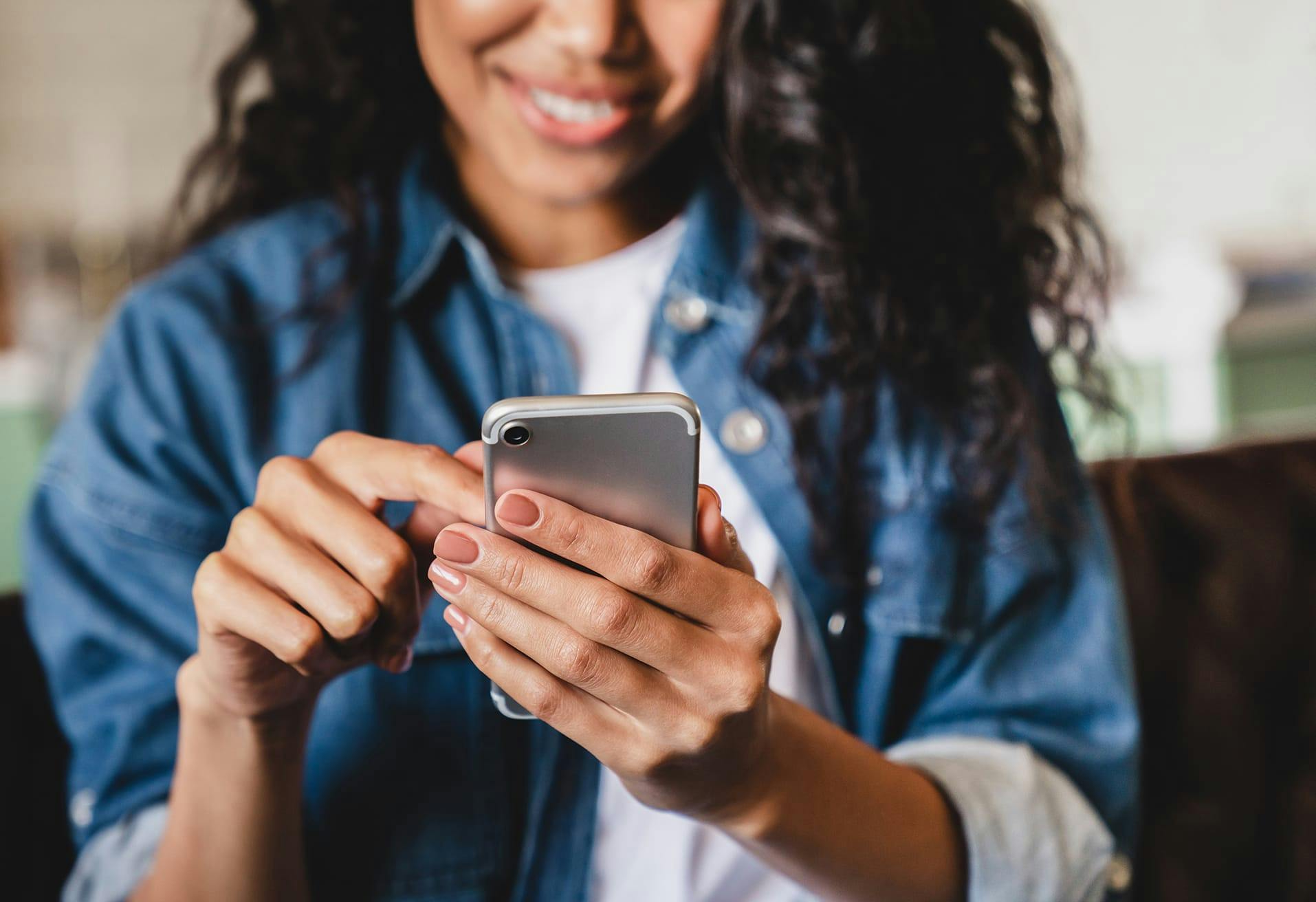 woman holding phone